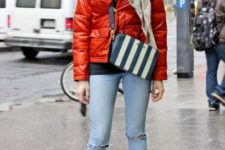 With striped bag, crop jeans and metallic boots