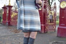 With striped dress and sweater