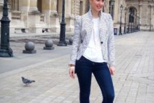 With striped jacket and skinny jeans