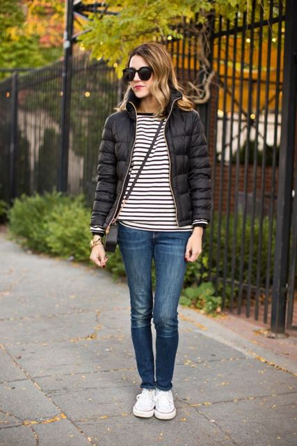 With striped shirt, jeans and sneakers