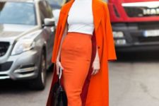 With white shirt, orange pencil skirt and neutral pumps