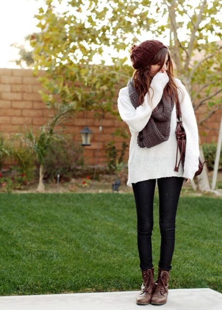 With white sweater and skinnies
