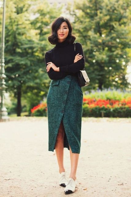 Wrap skirt with black turtleneck and two color loafers