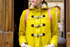 Yellow coat with pink backpack