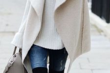 03 black knee-length boots, jeans, a white chunky knit sweater and a white coat