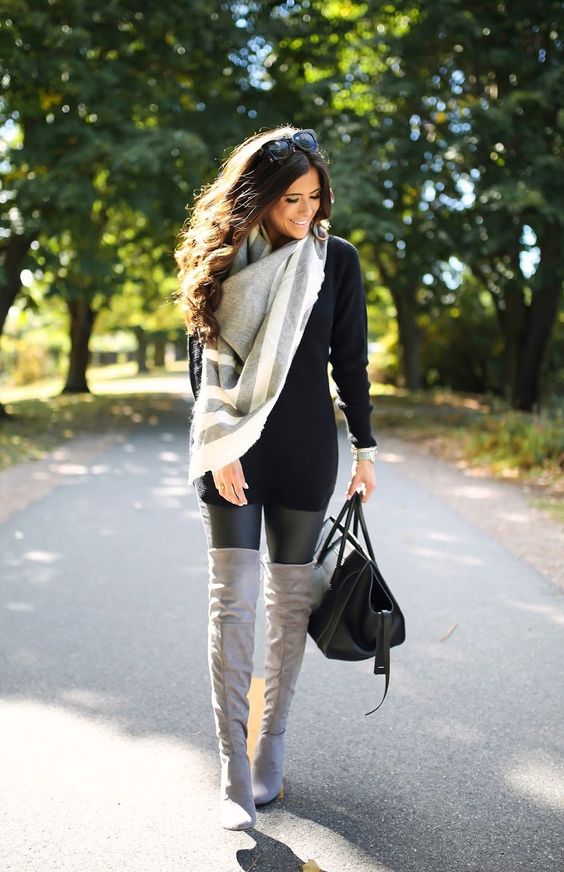 black sweater, a neutral blanket scarf, over the knee suede boots