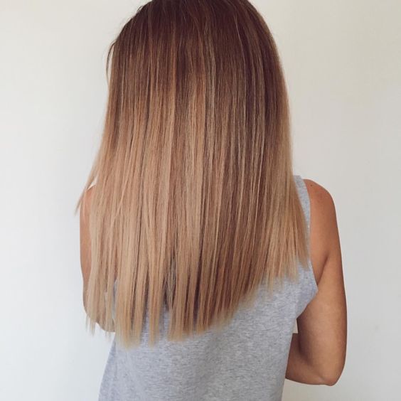 caramel straight hair with brown roots