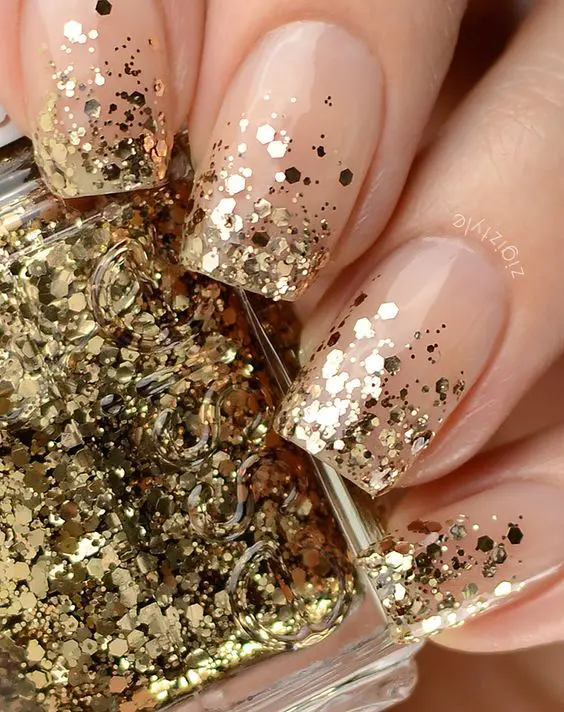 neutral nails with gold sequins in ombre technique (might work for Thanksgiving)