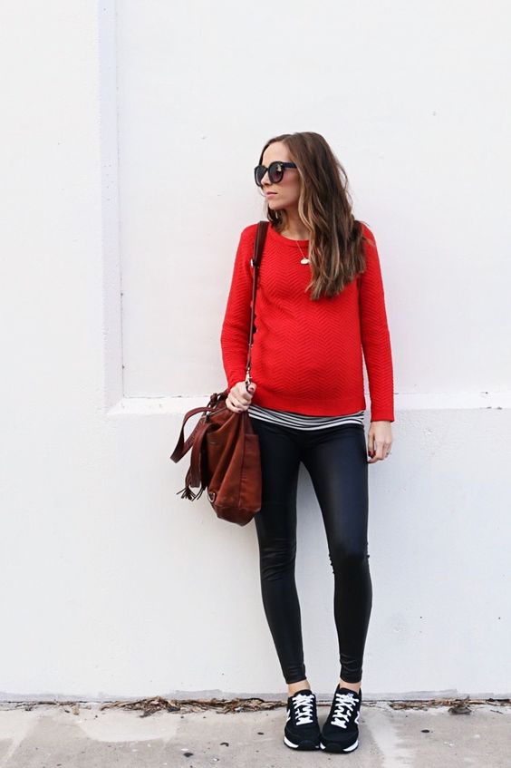 mom-to-be style with a red sweater, a striped shirt and chucks