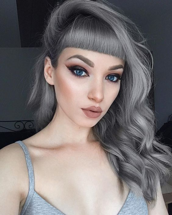 silver grey hair looks awesome with pale complexion and blue eyes