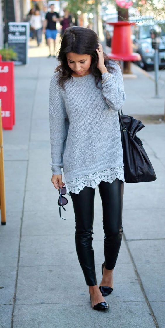 leather leggings, a long grey sweater with a lace hem and black flats