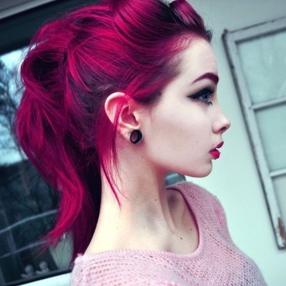 black roots and magenta is a bold combo