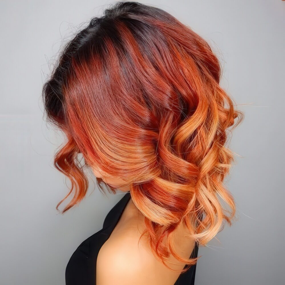 Balayage with black roots, red and copper highlights