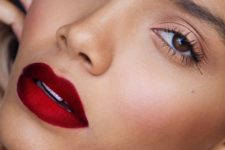 15 darker complexion and a bold red lipstick