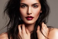 16 deep red lipstick and neutral makeup