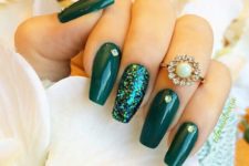 17 green nails and an accent green sequin nail looking as a mermaid tail
