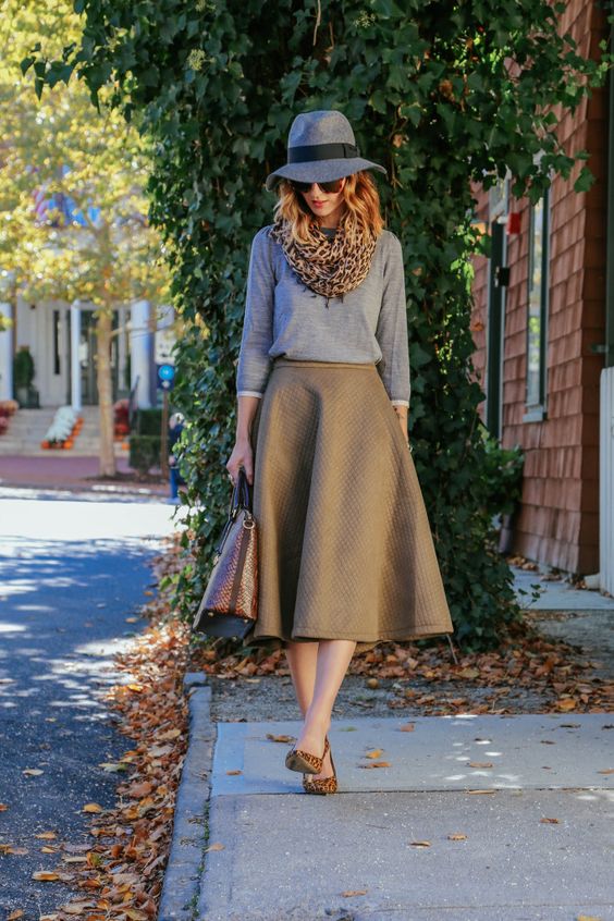 comfy fall look with a brown midi, a grey sweater and leopard shoes