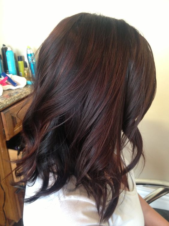 dark brown hair with black cherry highlights