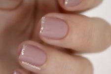 22 nude nails with a glitter hem