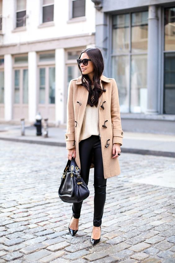 leggings, a neutral sweater, a camel coat and heels