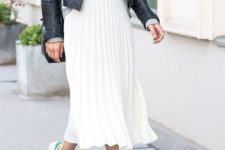 30 sporty look with a white pleated skirt and sneakers, a grey top and a black leather jacket