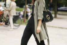 With black bag and olive green blazer