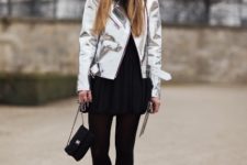 With black mini dress, tights, platform ankle boots and mini bag