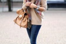 With camel sweater, plaid scarf and jeans