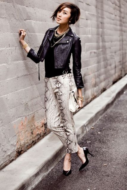 With crop jacket, statement necklace and pumps
