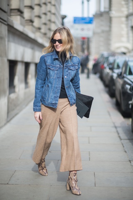 With culottes, denim jacket and clutch