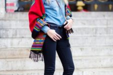 With denim shirt, skinny jeans and colored scarf
