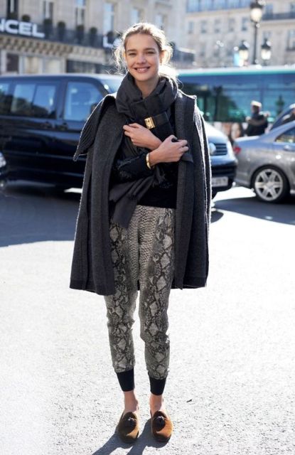 With gray coat, scarf and loafers