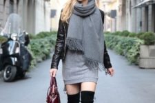 With gray dress, oversized scarf and leather jacket