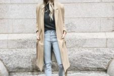 With gray sweater, light color jeans, neutral coat and boots