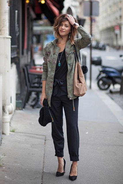 With green army jacket, pumps and light brown tote