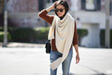 With jeans, shirt and oversized scarf