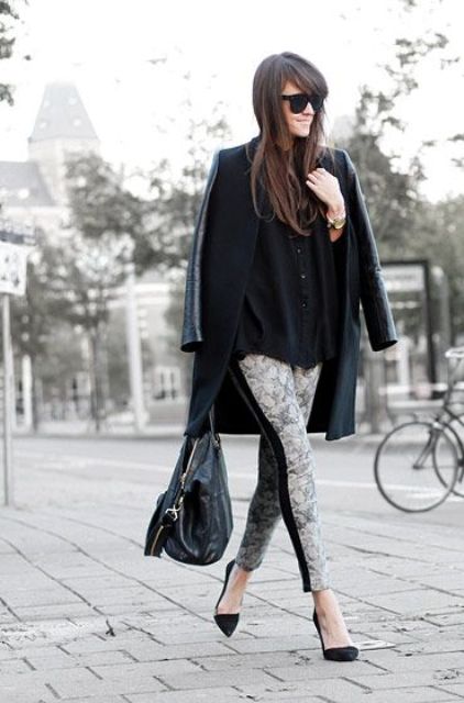 With knee-length coat, loose black blouse and pumps