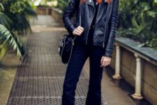 With leather balck jacket, crop pants and bag