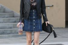 With leather jacket and mini denim skirt