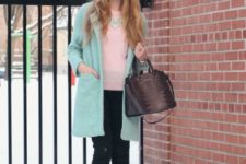 With light pink shirt, mint coat and black pants