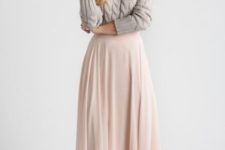 With maxi pastel color skirt