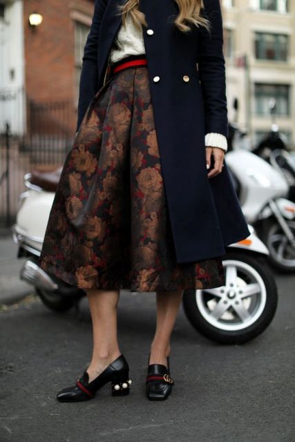 With midi coat, shirt, red belt and black shoes