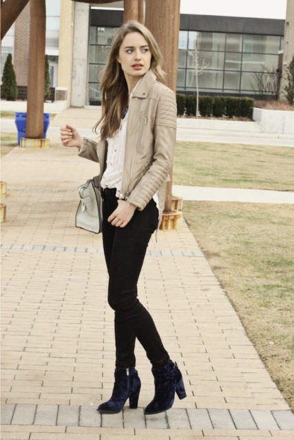 With neutral color leather jacket, skinny black pants and white shirt