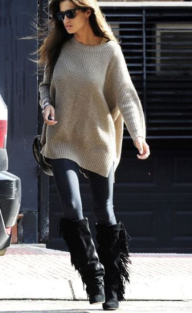 With oversized sweater and leggings