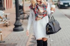 With oversized sweater, plaid scarf and over the knee suede boots