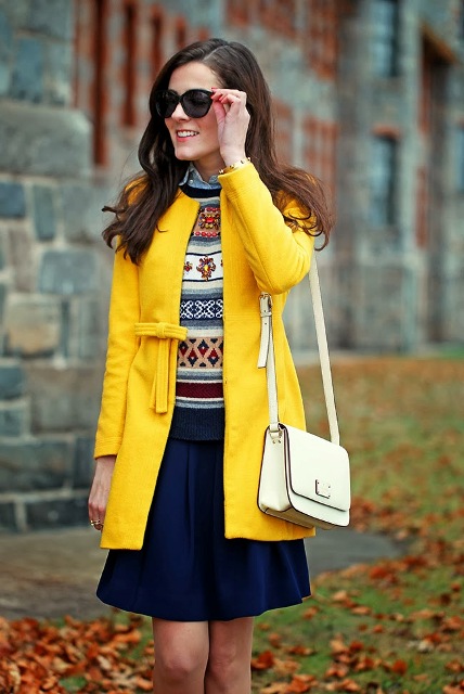 With printed sweater and navy blue mini skirt