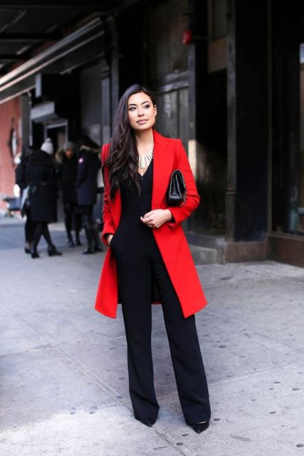 With red coat and black clutch