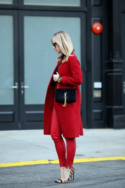 With red skinny pants, animal printed shoes and small black bag