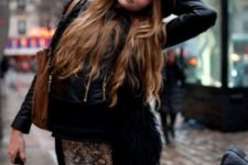 With wide brim hat, jacket with fur, flat ankle boots and leather bag