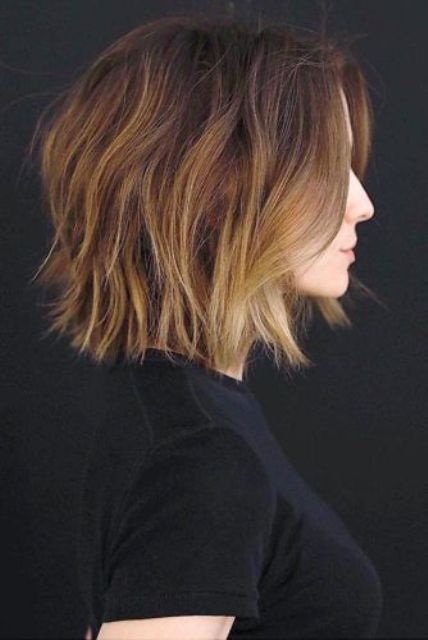 a beautiful brunette long bob with caramel and blonde highlights and messy waves is a chic and cool solution